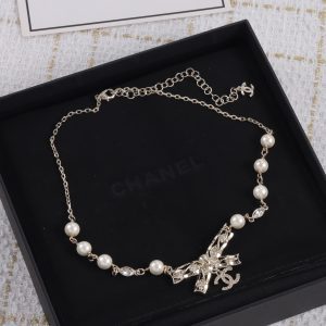 Gold Pearl and Bow Pendant Necklace