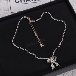Gold Pearl and Bow Pendant Necklace