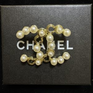 Golden pearl brooch