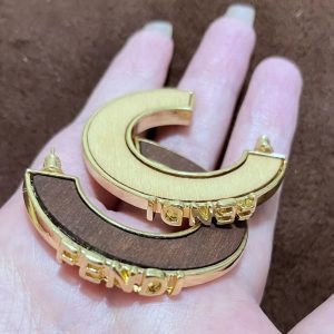 Golden semi-circular wooden earrings